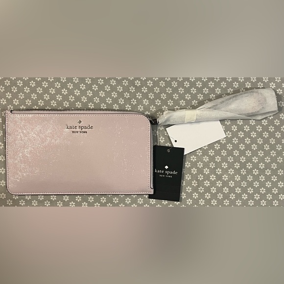 kate spade Handbags - Kate Spade Zip Pouch Wristlet Lilac Moon card holder NWT in package